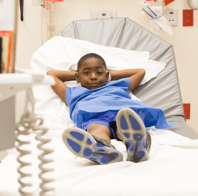 Patient in hospital bed at St. Louis Children’s