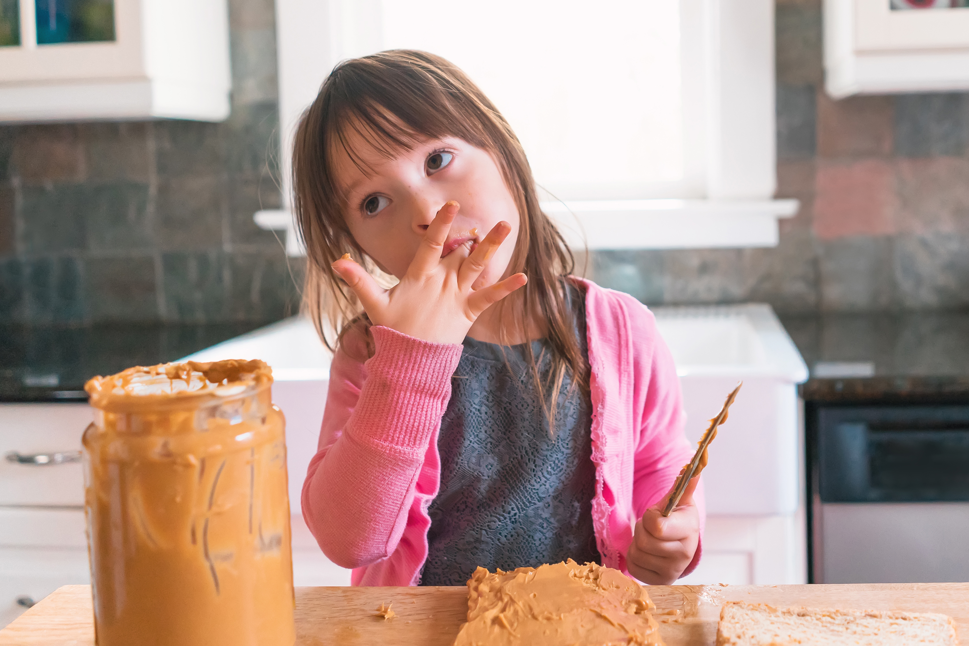 Child eating peanutbutter
