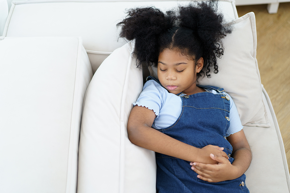 Child sleeping on a couch