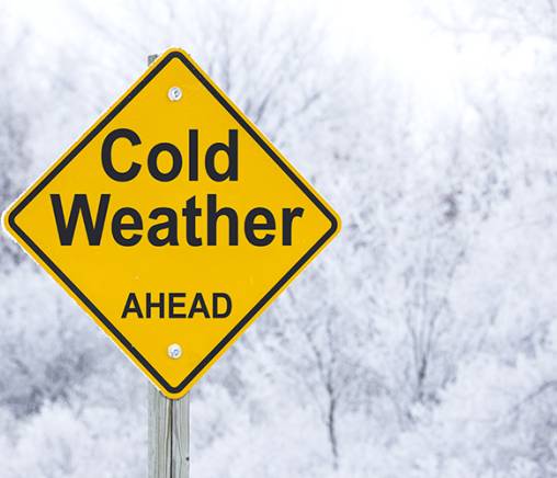 Graphic with a "Cold Weather Ahead" road sign