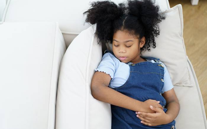 Child sleeping on a couch